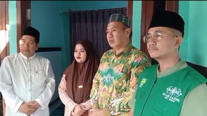 
					Keluarga Nortaji saat foto bersama yang berasal dari kecamatan Besuk